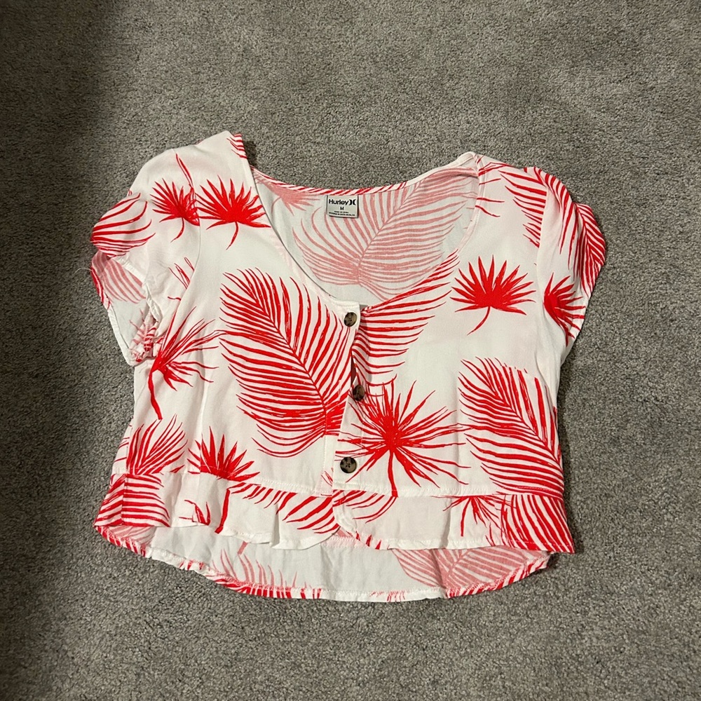 Hurley top size medium with a fun beachy pattern